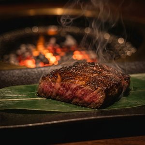 Charcoal wagyu on cedar leaf
